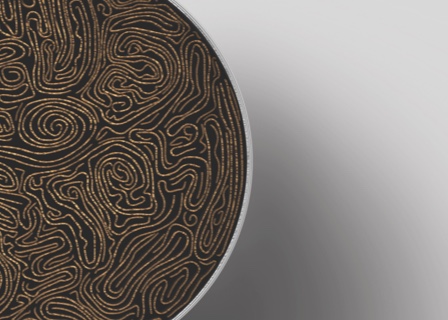 Close up of the swirling compressed tobacco pattern of a HEETS stick